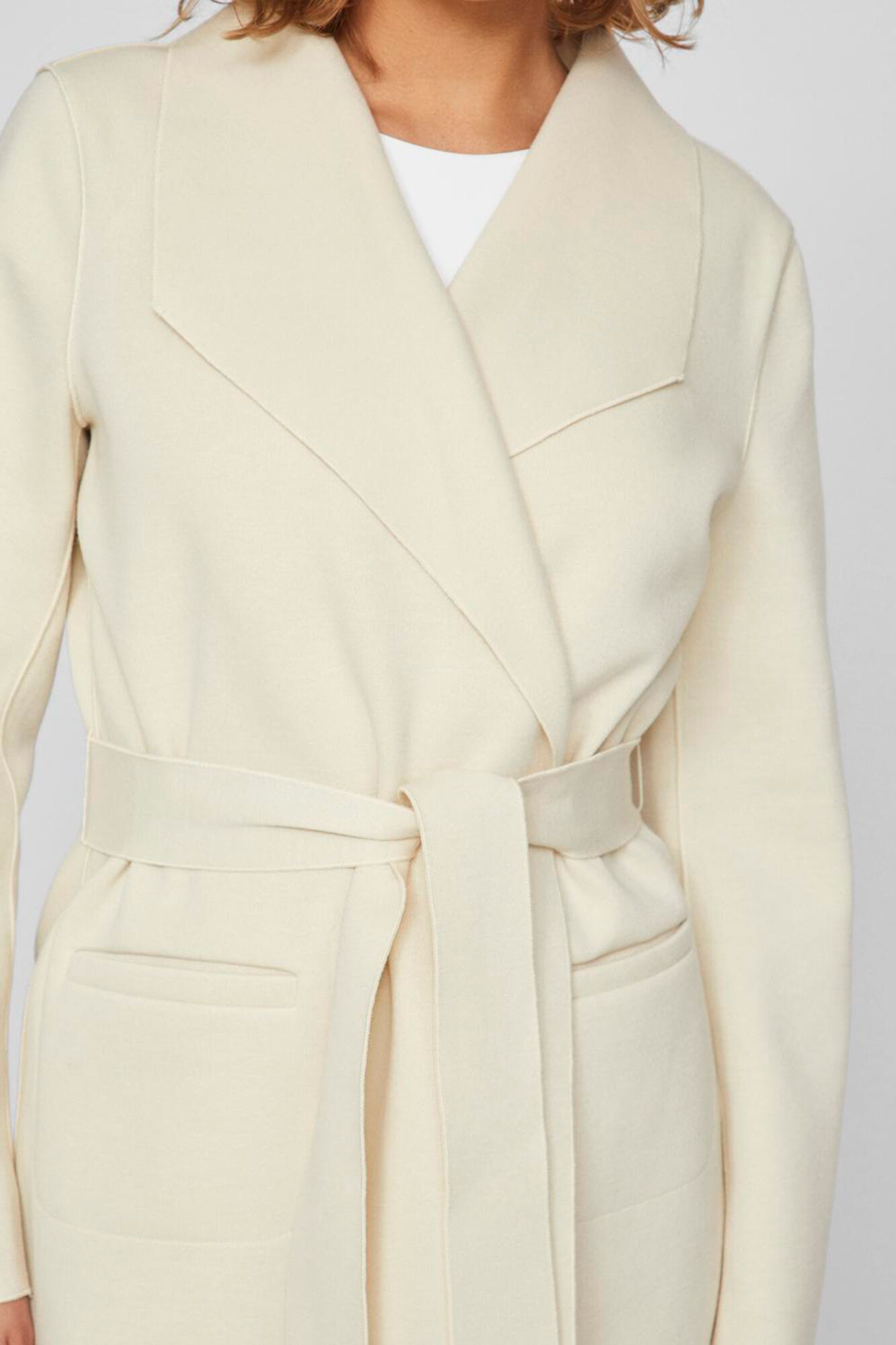 Vila Sobretudo longo com n&oacute;