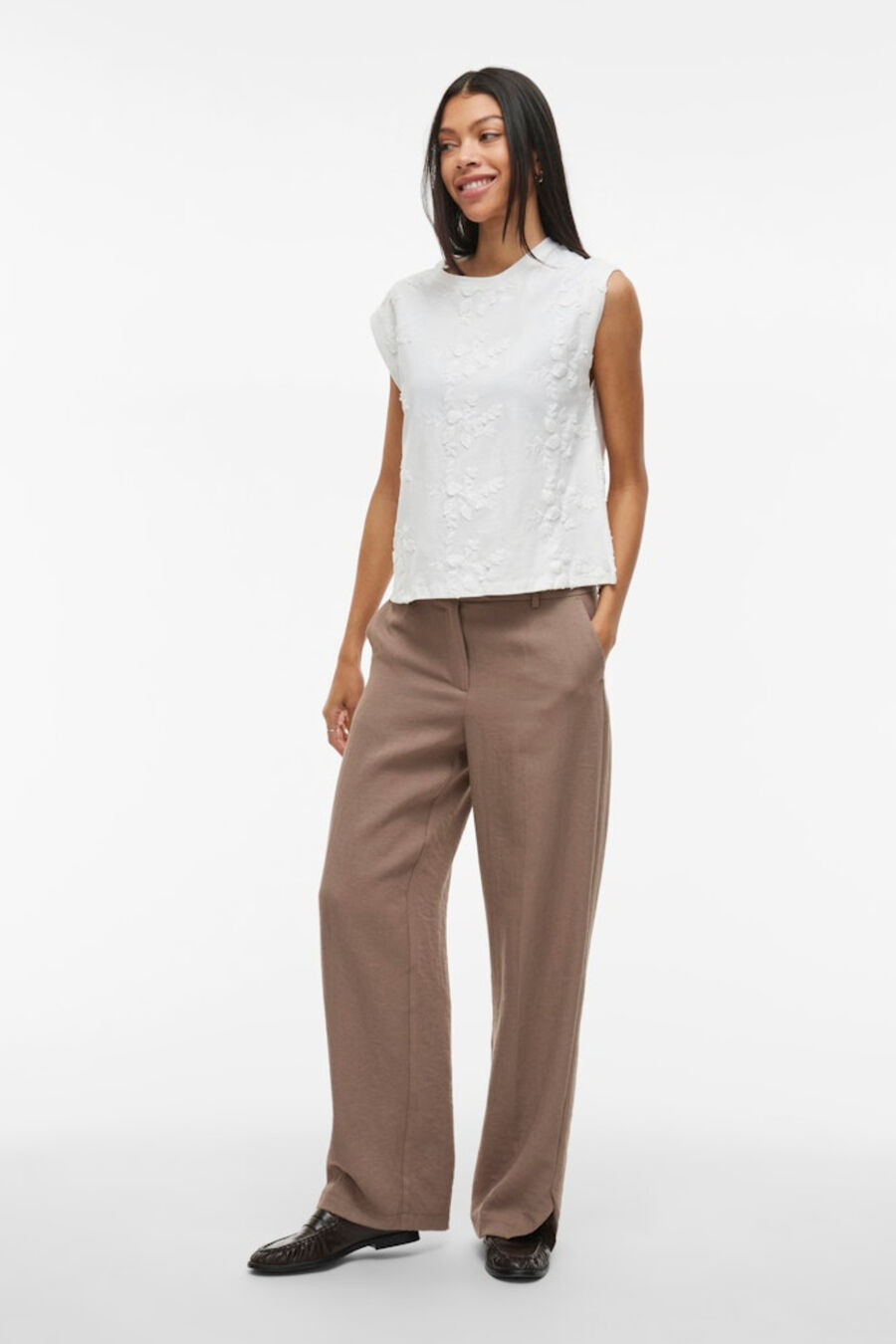 Top sin mangas con bordados de algodón