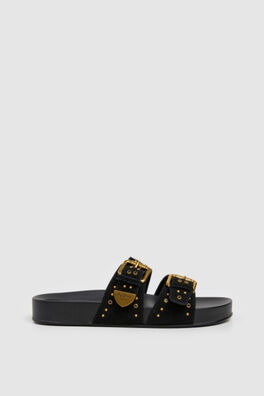 Sandalias planas tachuelas