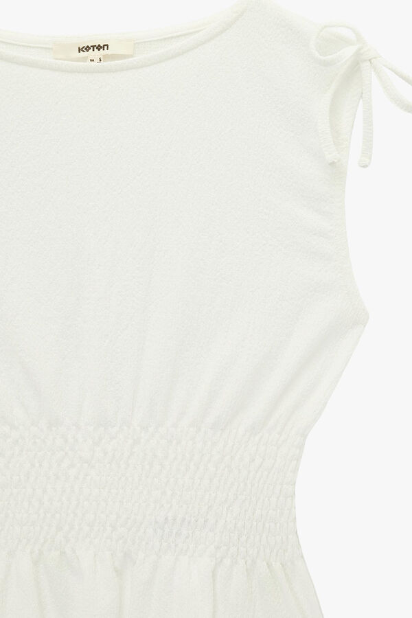 Koton Top sin mangas lazo beige