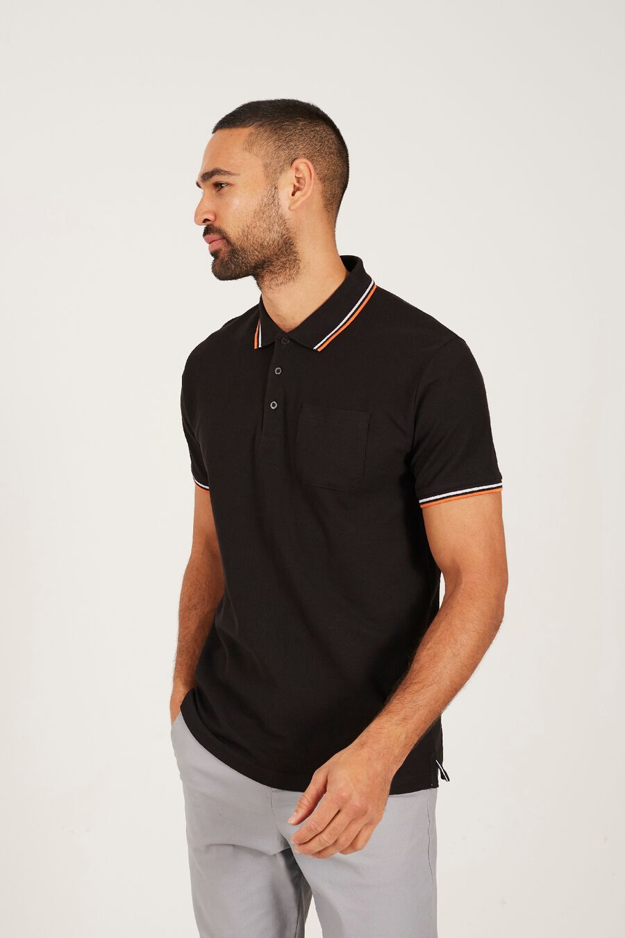 Polo de manga corta con bolsillo