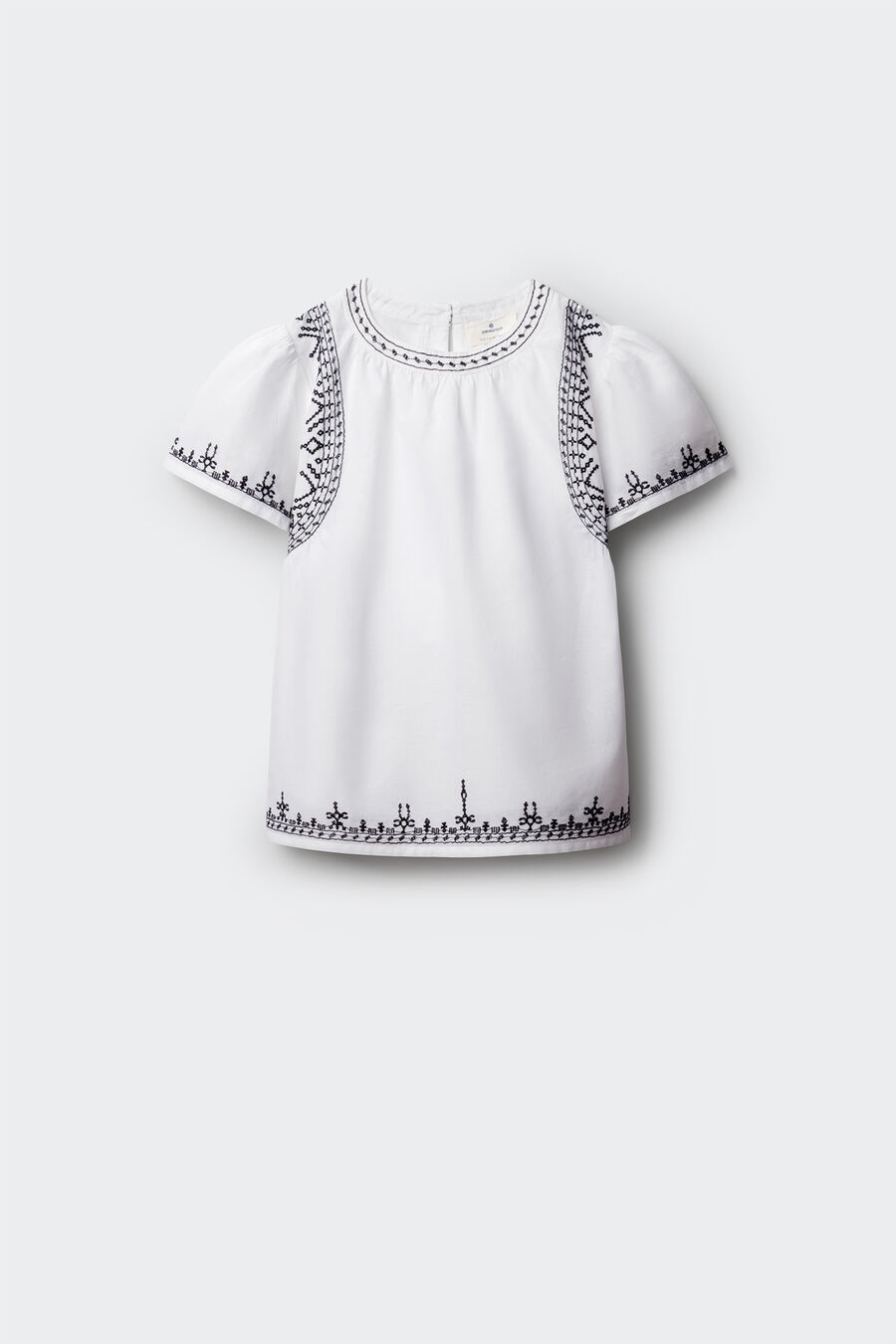 Blusa blanca bordados niña