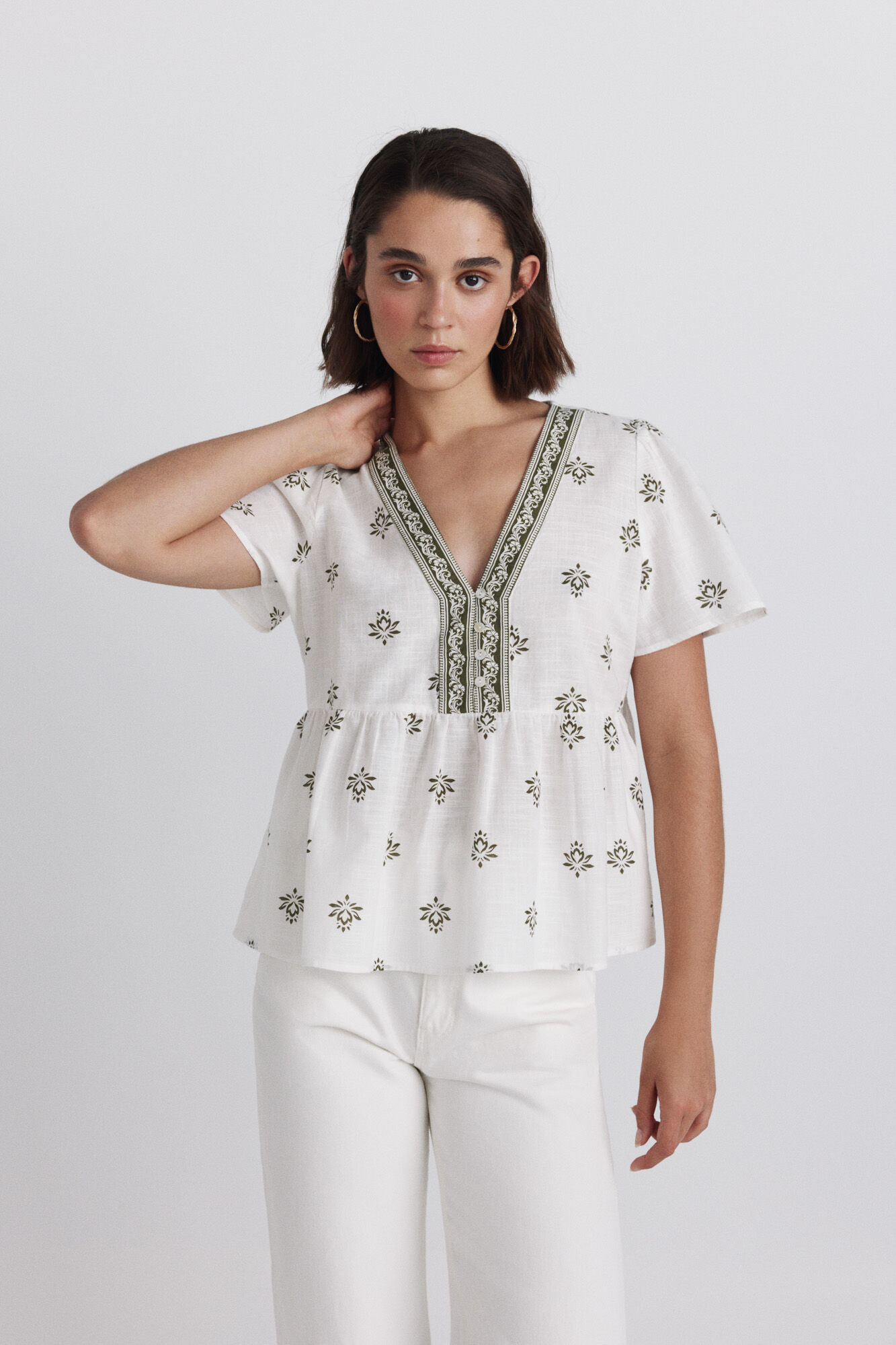 Springfield Peplum shirt with neckline details