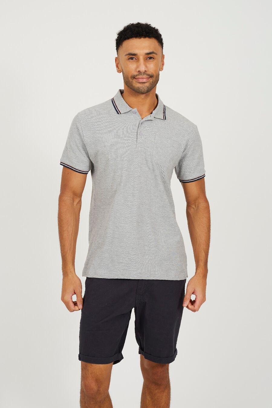 Polo de manga corta con bolsillo