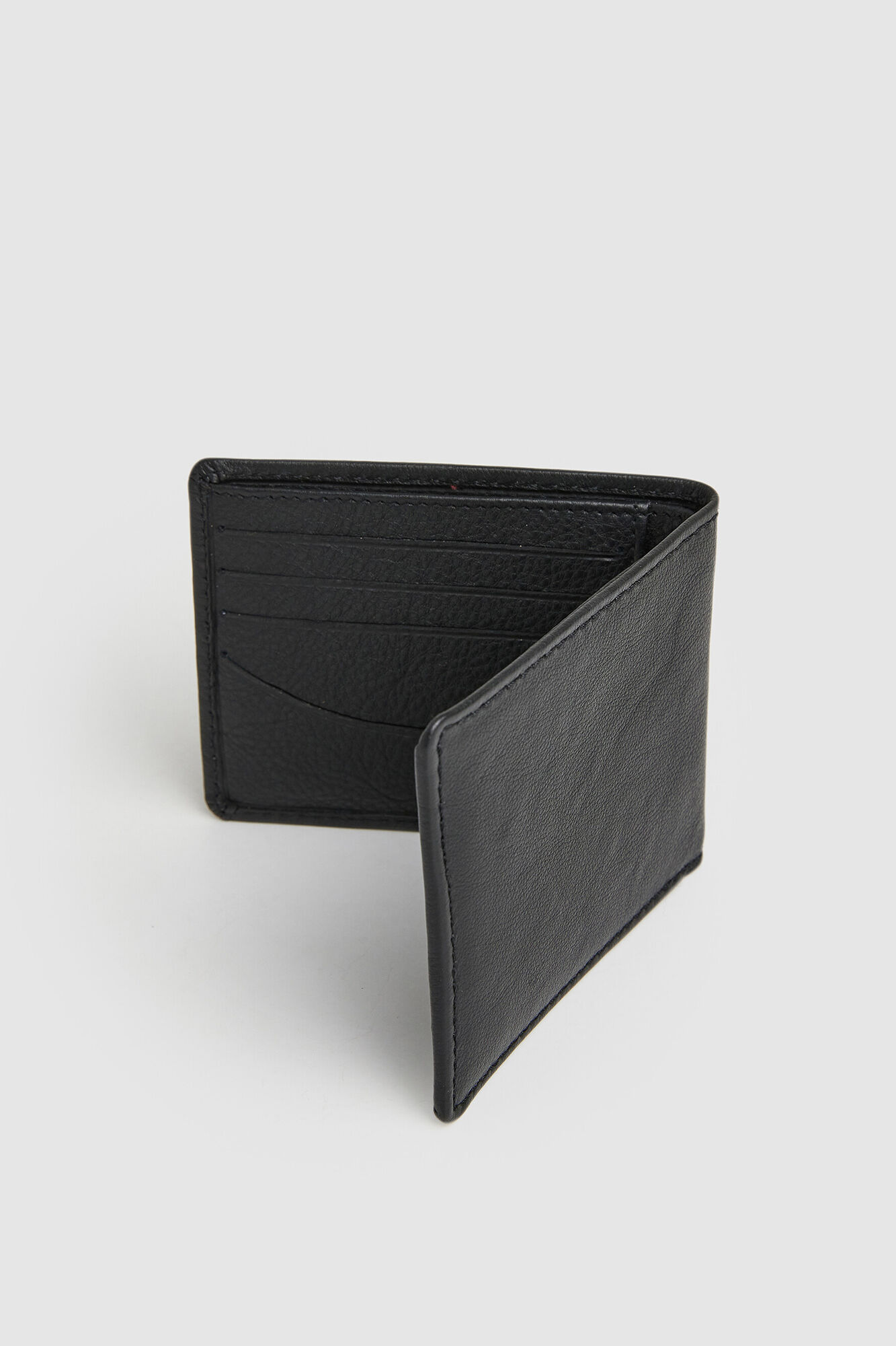Embossed logo leather wallet | Men's accessories | SPF