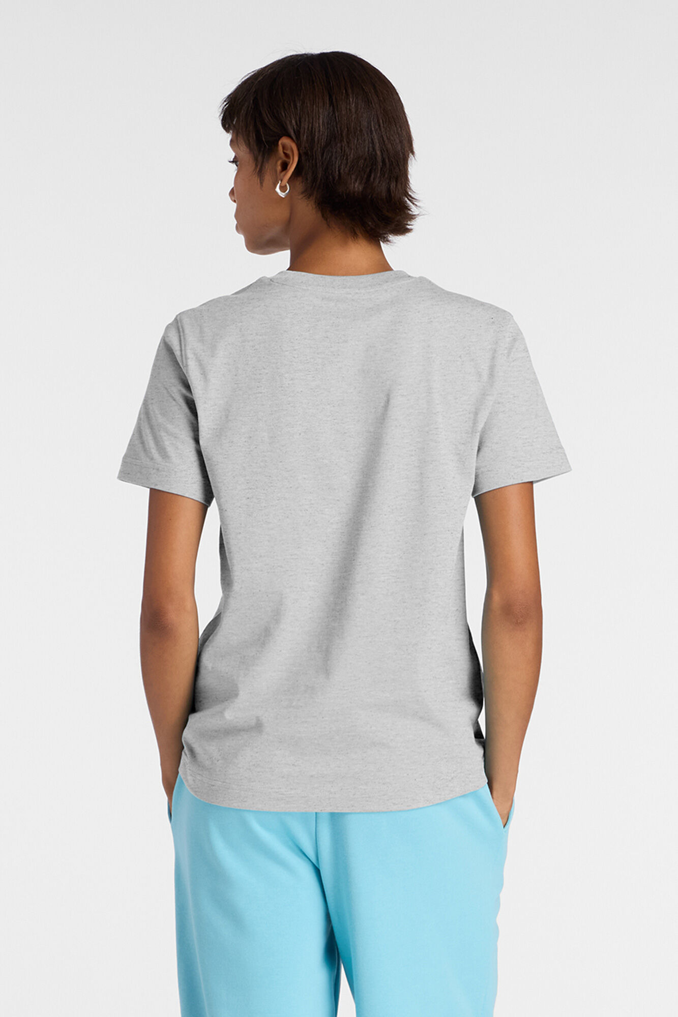 New Balance T-shirt desportiva b&aacute;sica