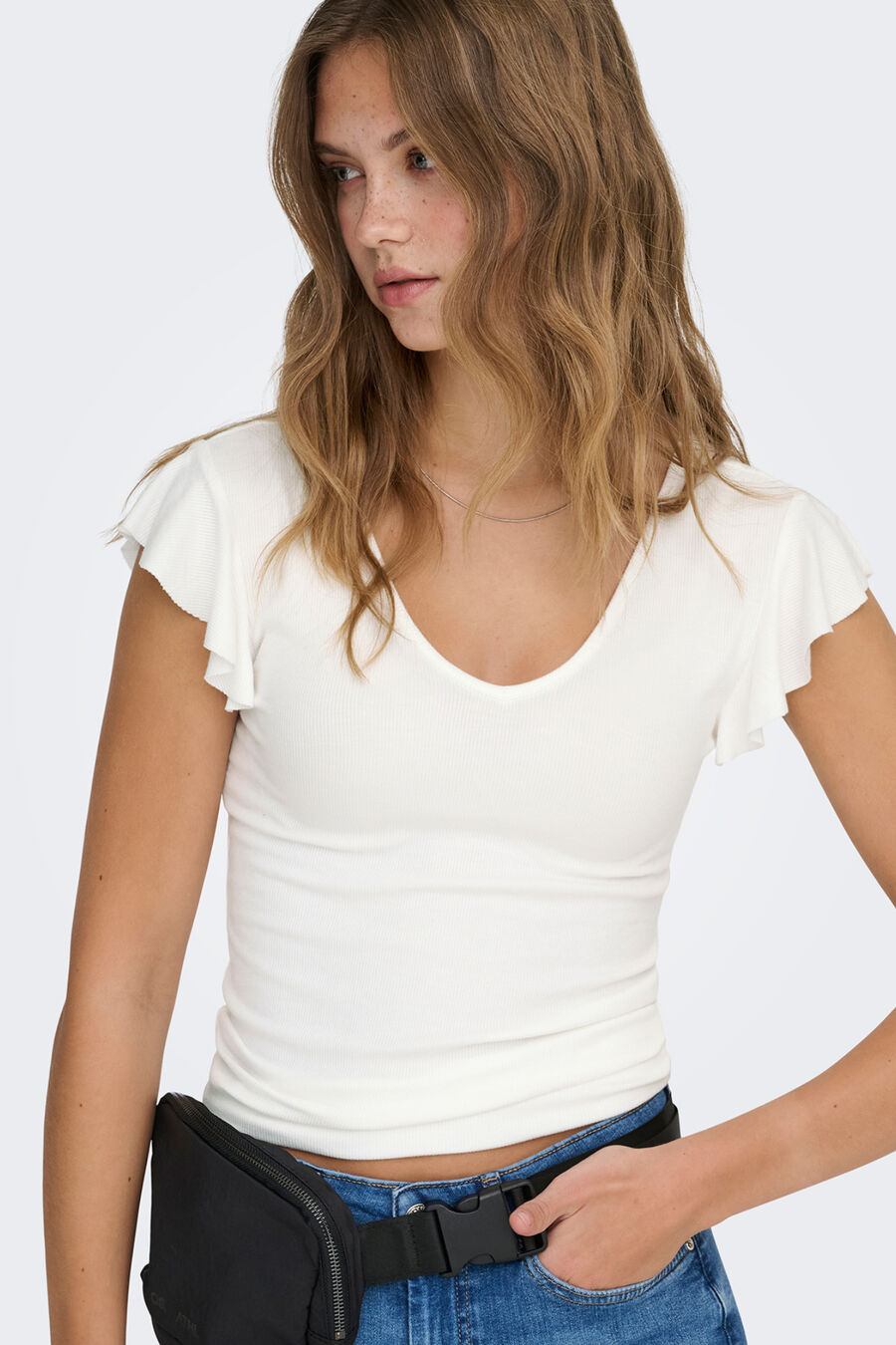 Top ajustado con volantes