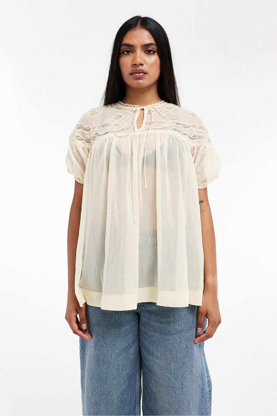 Blusa semitransparente