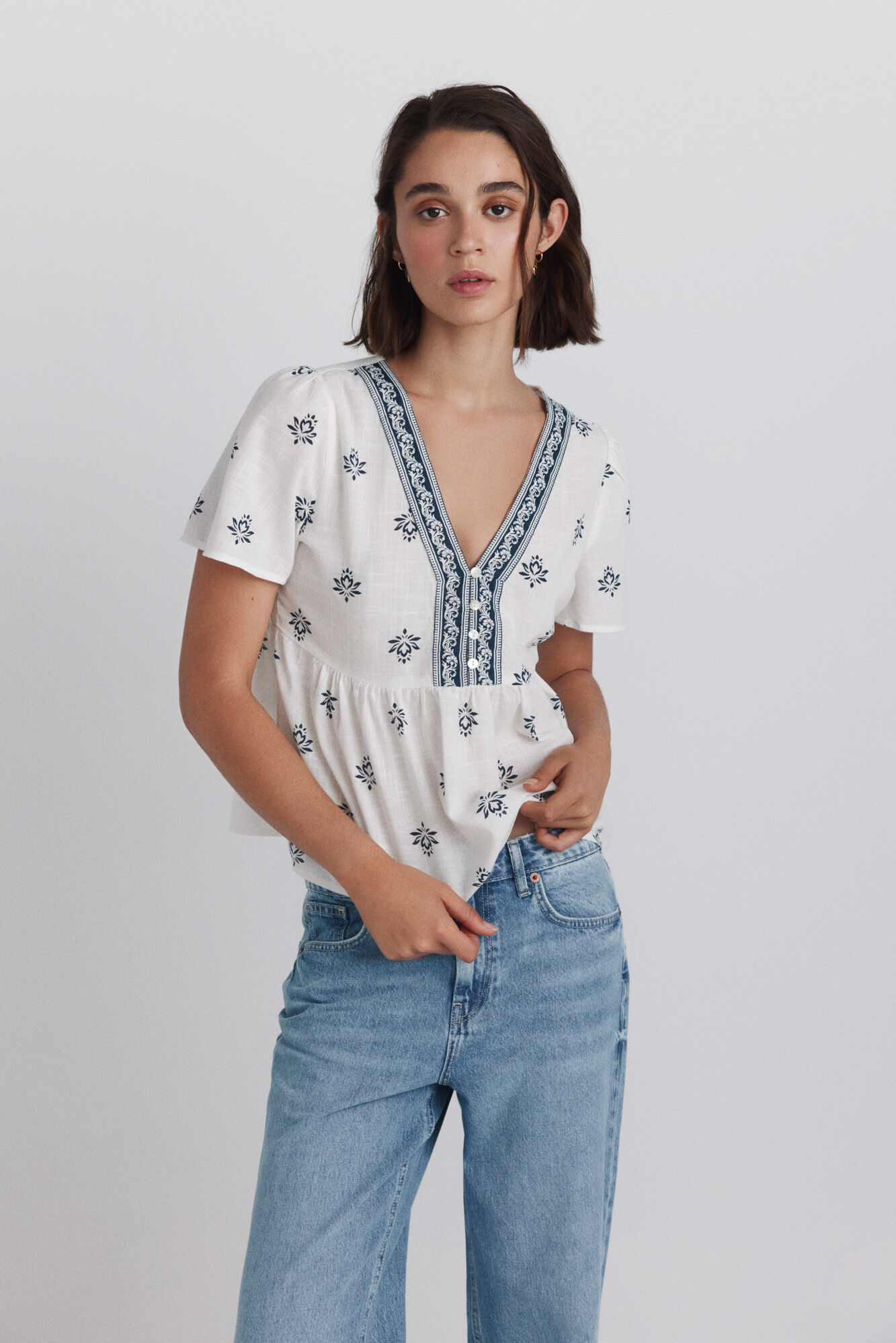 Springfield Camisa peplum detalles escote