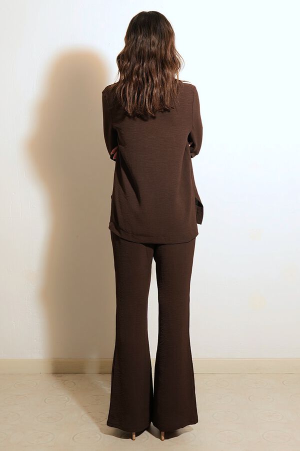 Cul Sac Fluid flared trousers brown