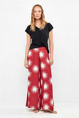 Pantalón largo pierna ancha estampado soles