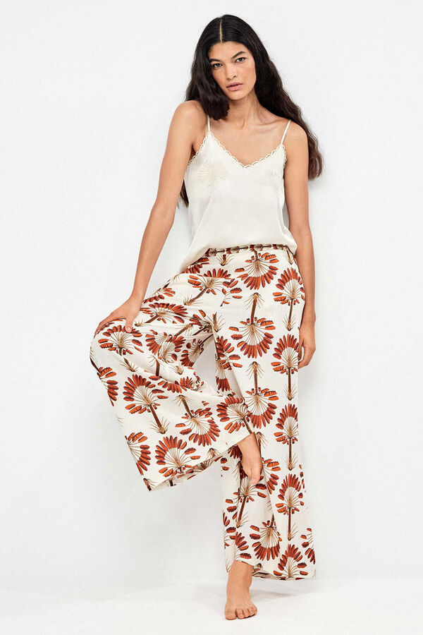 Gisela Pantal&oacute;n largo pierna ancha estampado palmeras blanco