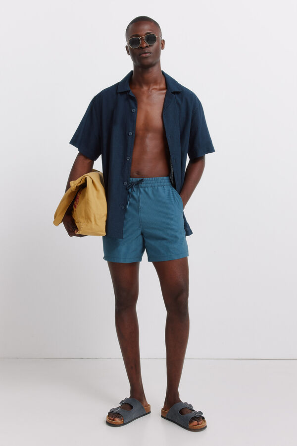 Conjunto de polo y ba&ntilde;ador