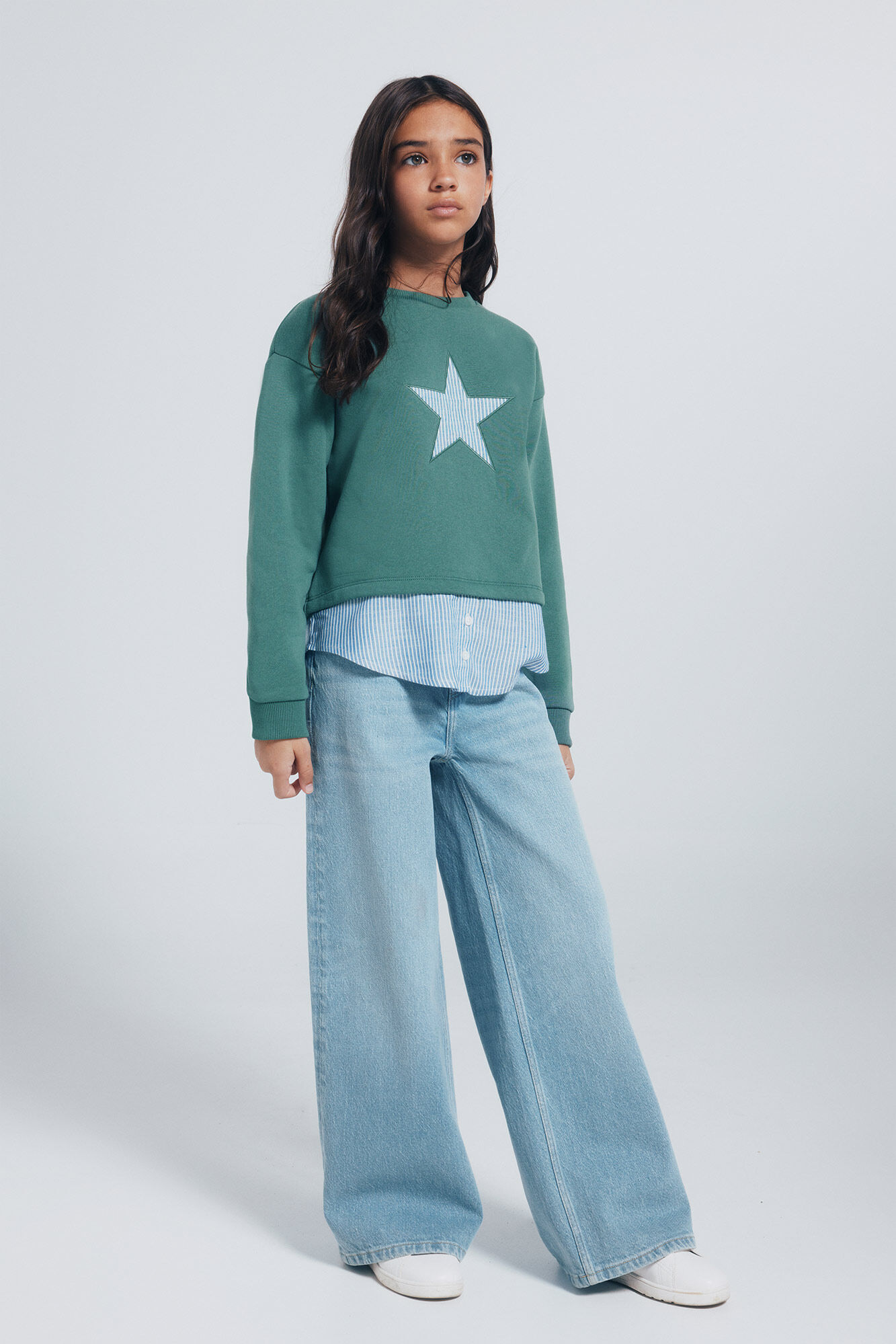 Conjunto de sudadera y jeans