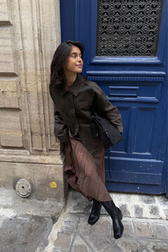 Conjunto de bota, chaqueta y falda