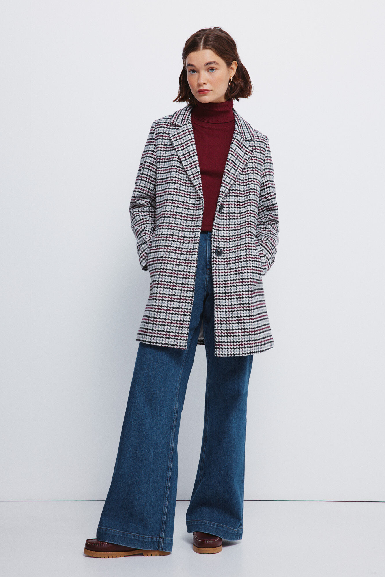 Ensemble manteau, jeans et pull