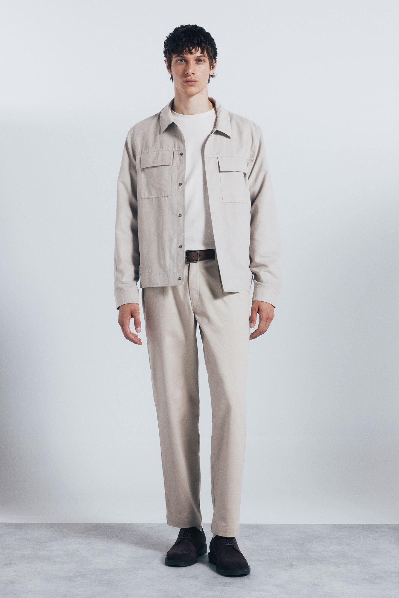 Conjunto de cal&ccedil;a e blus&atilde;o