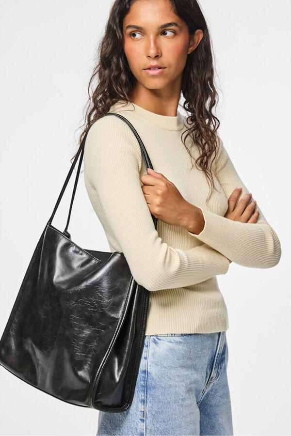 Conjunto de botin, jeans, jersey y bolso