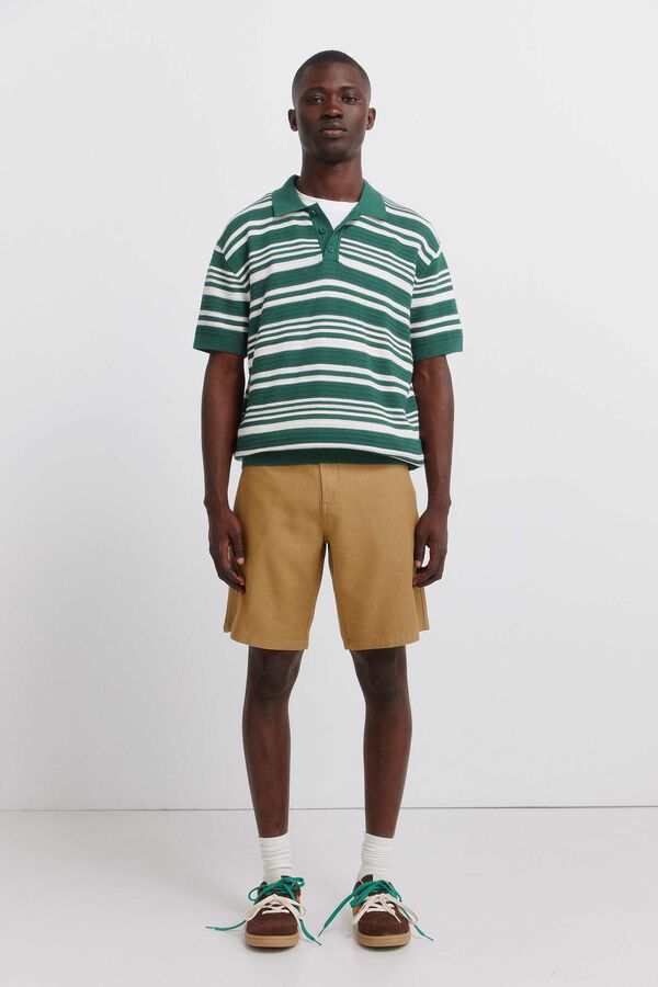 Conjunto de polo e bermudas
