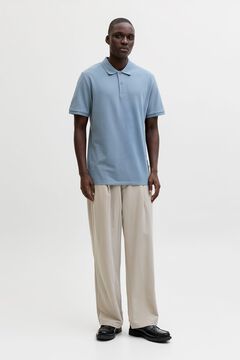 Conjunto de cal&ccedil;a e polo