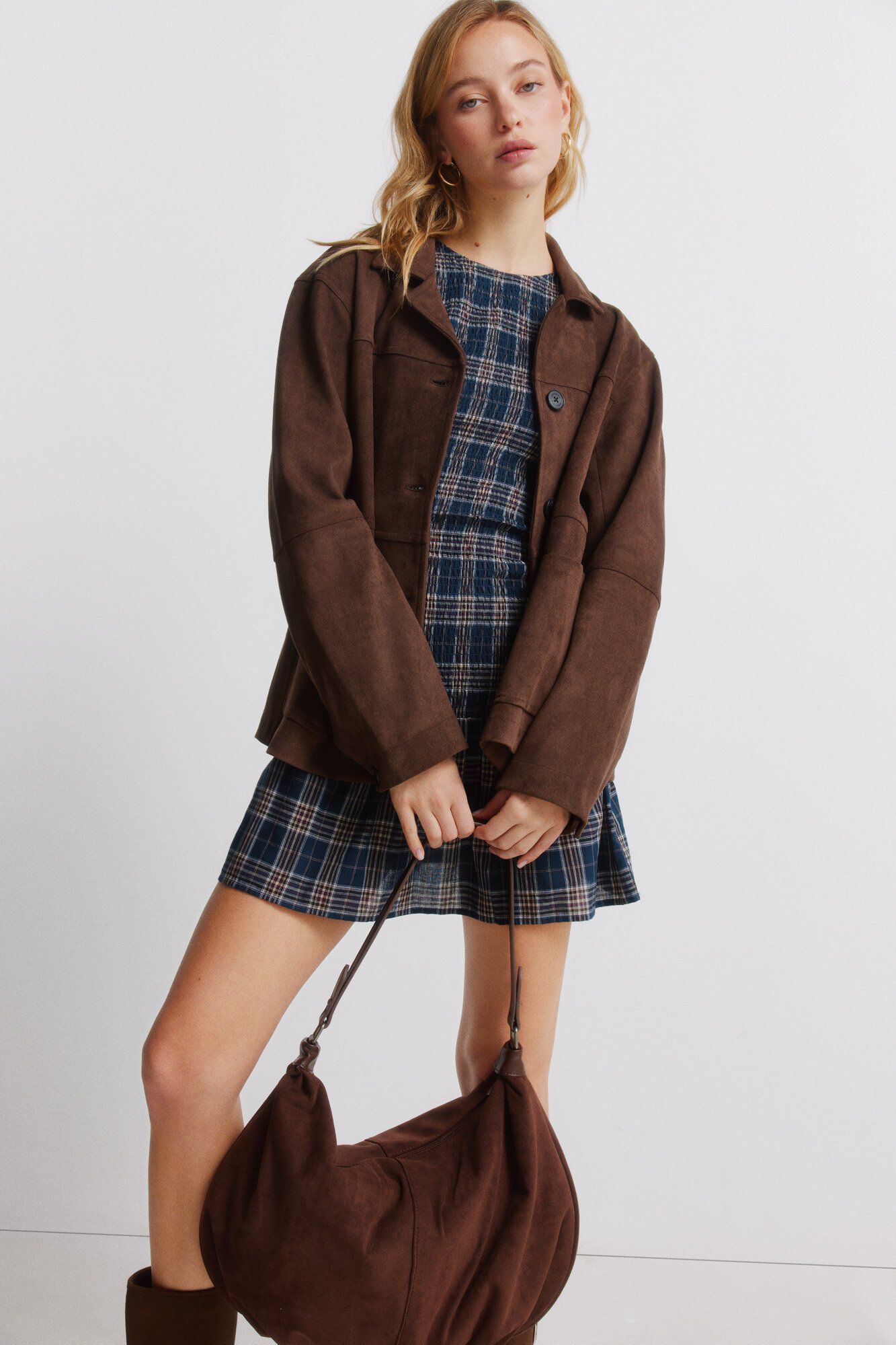 Conjunto de mala, camisa e cal&ccedil;as