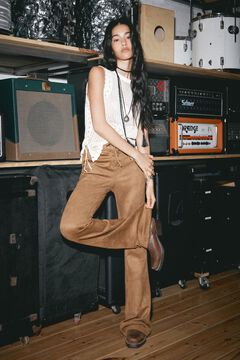 Conjunto de cal&ccedil;as e colete